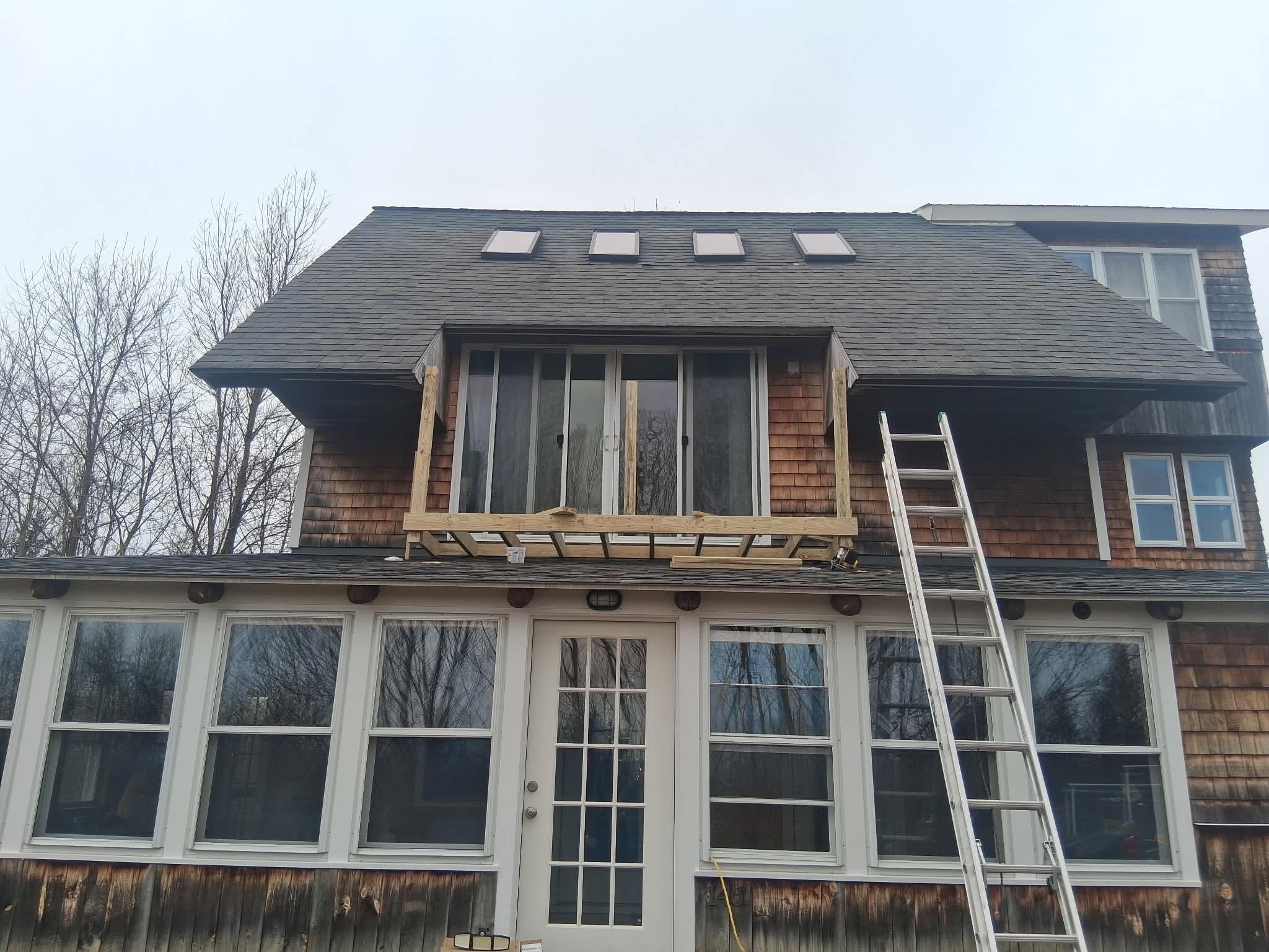 Rooftop deck — framing and ladder during construction